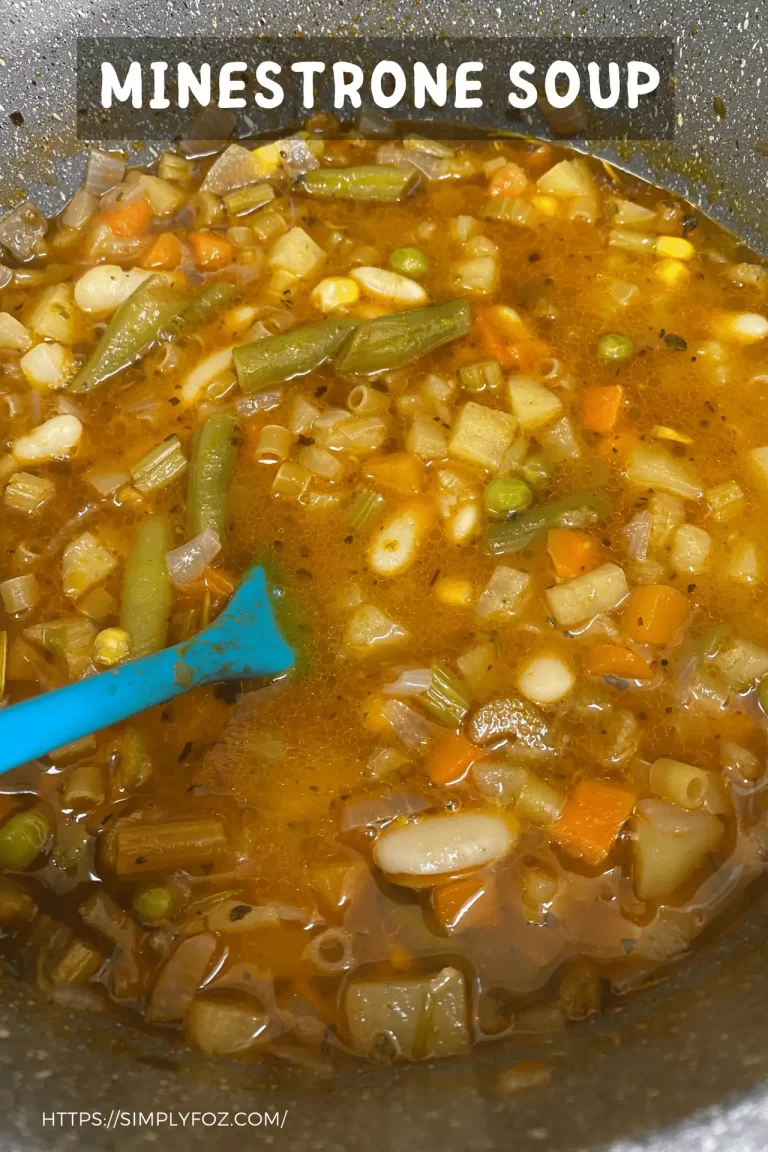 Minestrone soup with mixed vegetables in a pot, photographed for a recipe blog post on simplyfoz.com